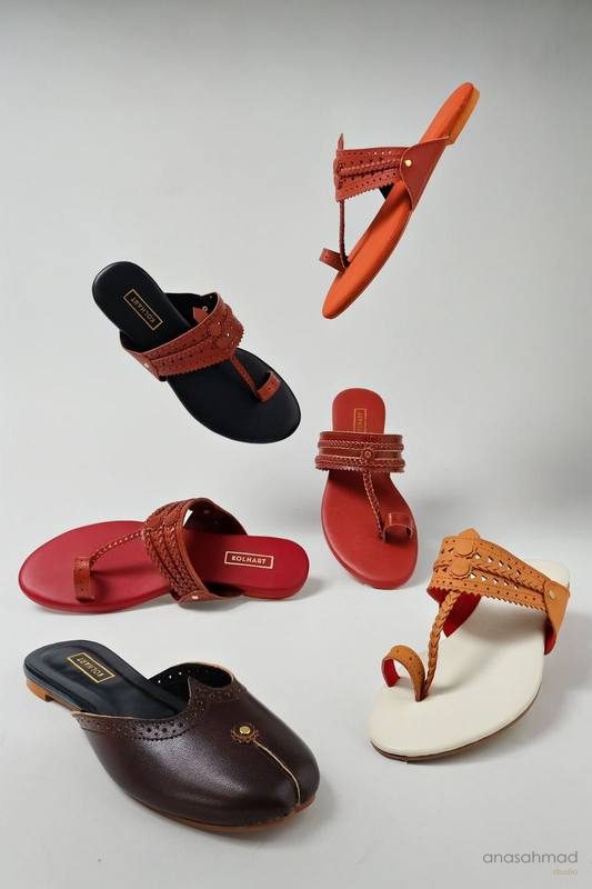 Six Kolhart sandal and mule colorways arranged in a full collection shot